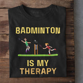 Black t-shirt with badminton graphics and text saying Badminton is my therapy