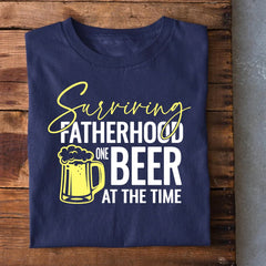 Surviving Fatherhood one Beer at a Time T-Shirt