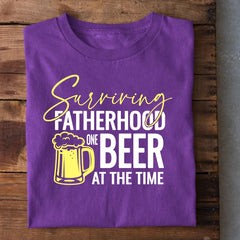 Surviving Fatherhood one Beer at a Time T-Shirt