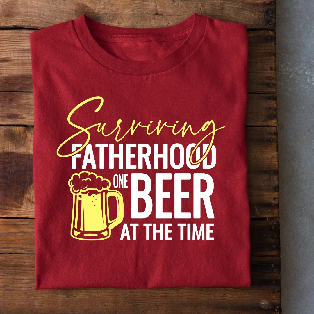 Surviving Fatherhood one Beer at a Time T-Shirt