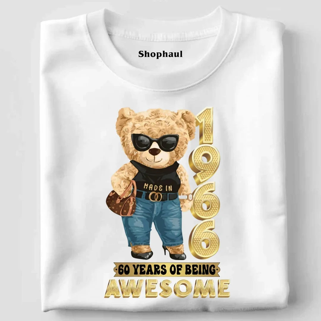 White t-shirt with stylish bear graphic, gold 1966 text, and '60 years of being awesome' message