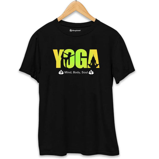 Black yoga printed t-shirt with yellow-green text and silhouette graphics, hanging on hanger